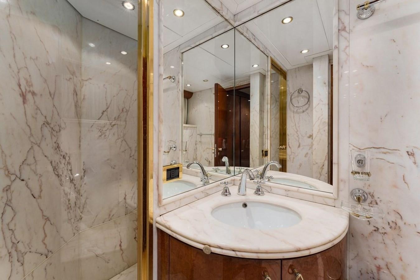 a bathroom with a large mirror aboard ALIA 7 Yacht for Sale