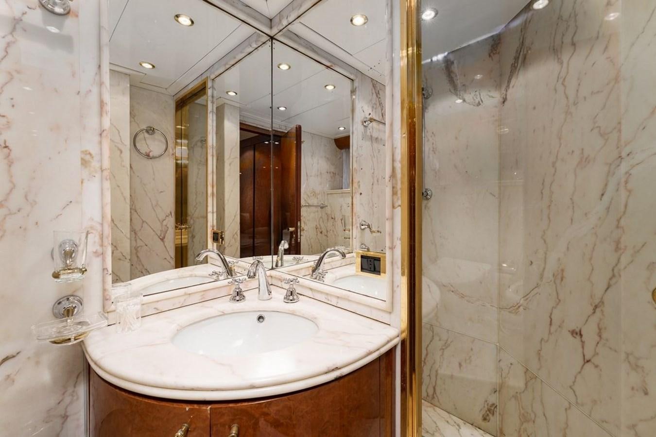 a bathroom with a large mirror aboard ALIA 7 Yacht for Sale