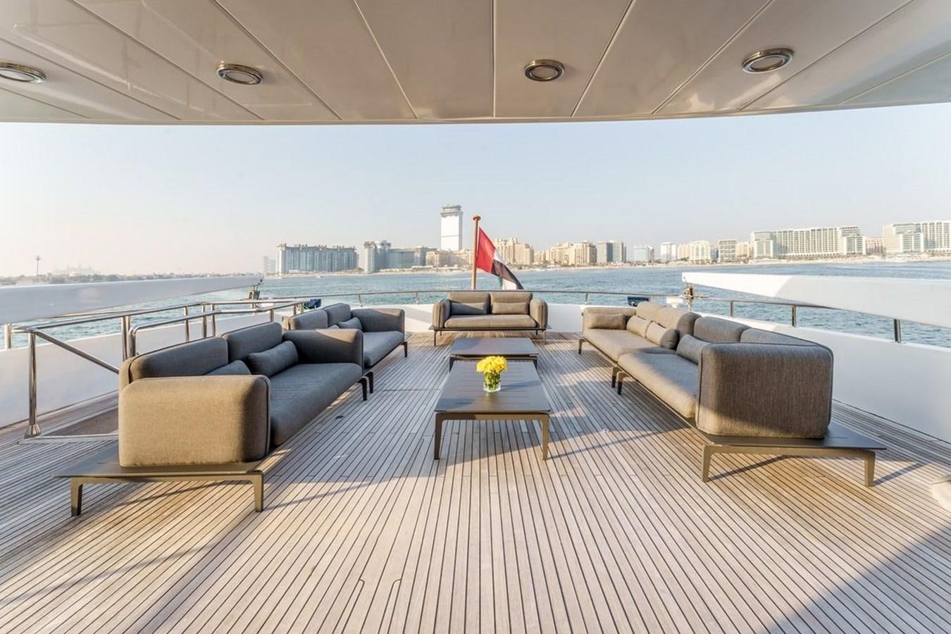 a large room with couches and a table aboard ALIA 7 Yacht for Sale