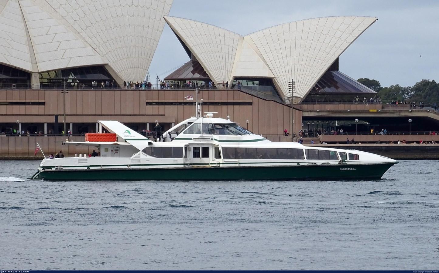 a boat in the water aboard 2000 SYDNEY SUPERCAT Yacht for Sale