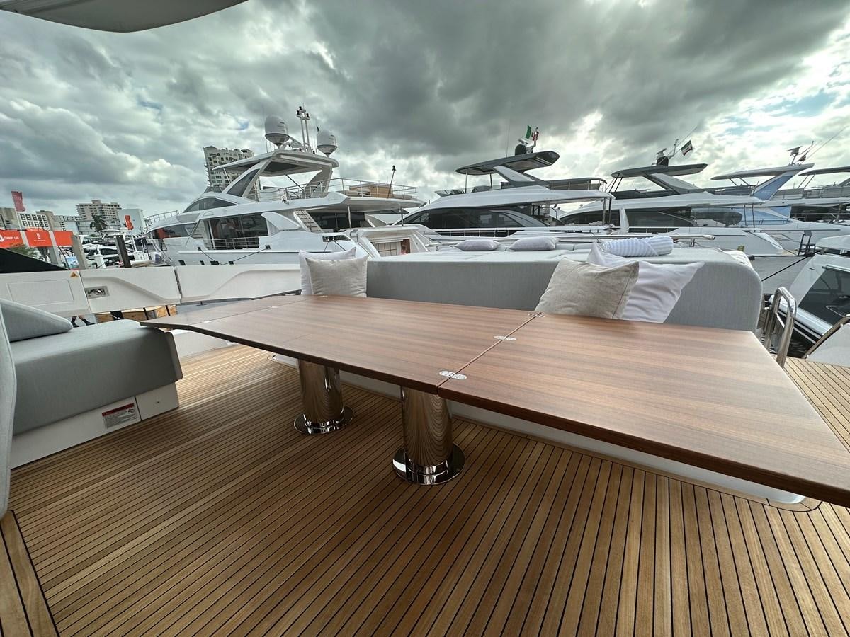 a deck with a row of airplanes on it aboard SUNSET 8 Yacht for Sale