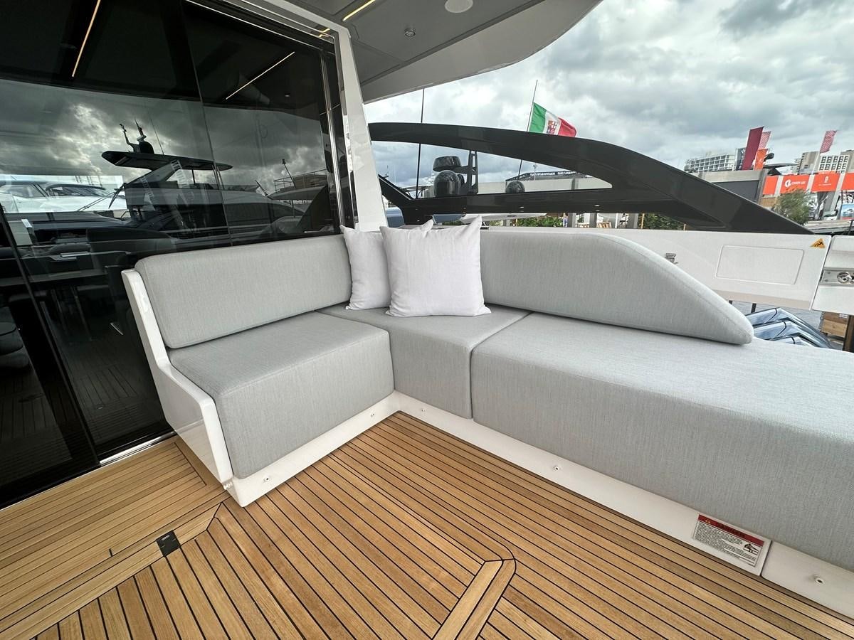 a couch in a car aboard SUNSET 8 Yacht for Sale