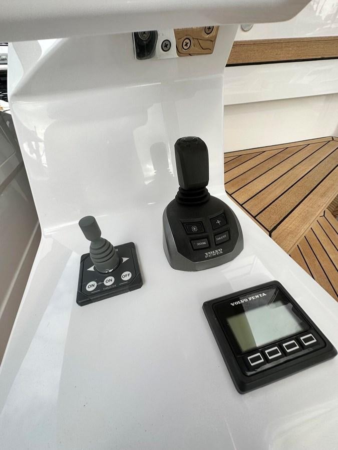 a black device on a white surface aboard SUNSET 8 Yacht for Sale