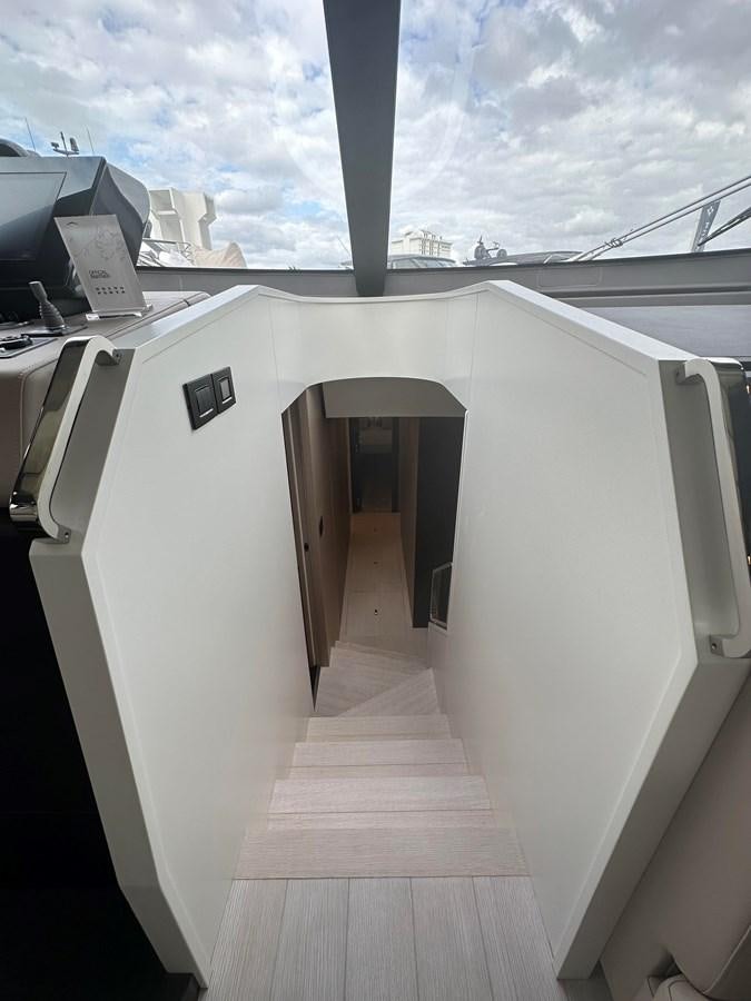 a room with a large window aboard SUNSET 8 Yacht for Sale
