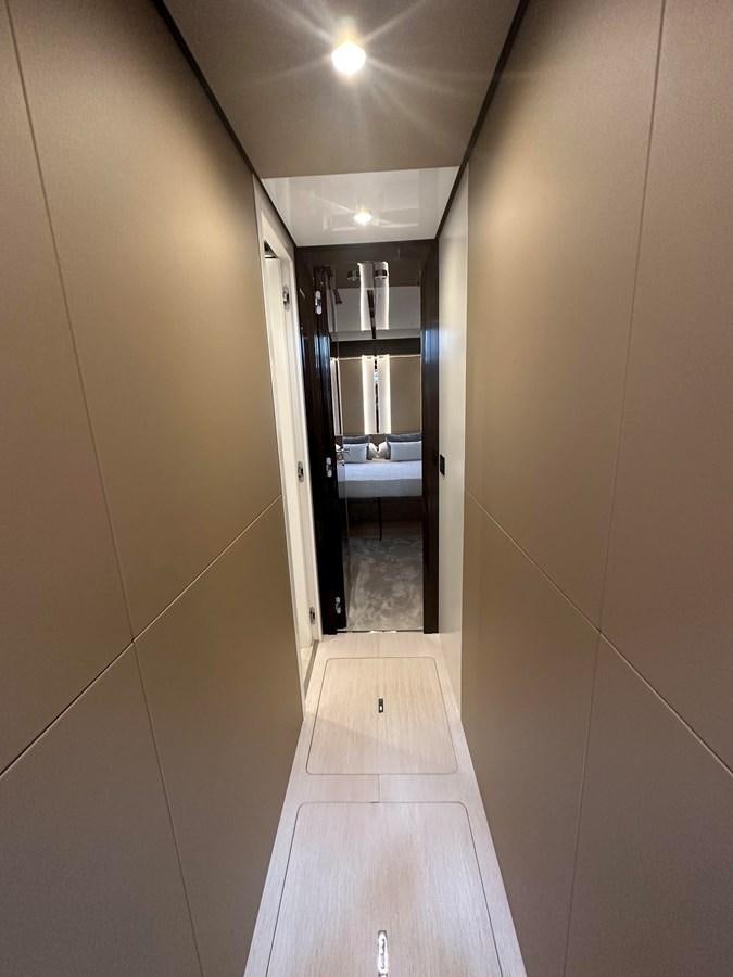 a hallway with a door and a mirror aboard SUNSET 8 Yacht for Sale