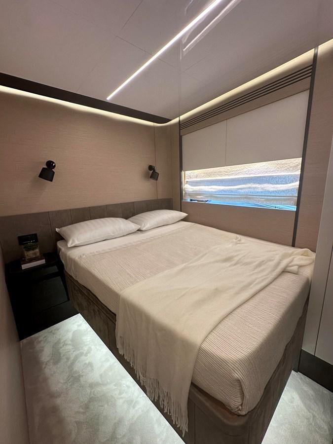 a bedroom with a large bed aboard SUNSET 8 Yacht for Sale