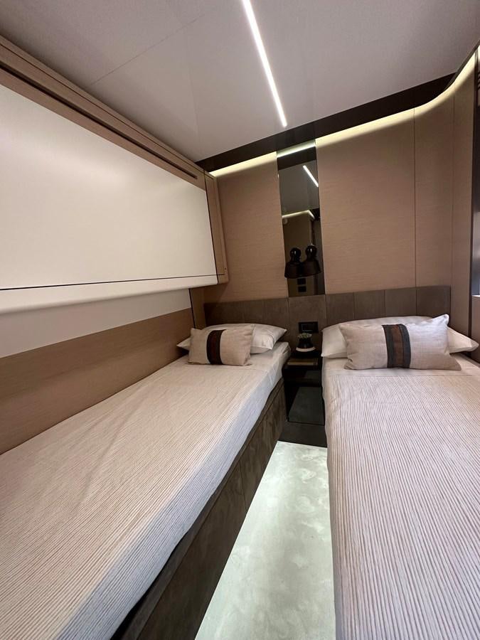 a room with two beds aboard SUNSET 8 Yacht for Sale