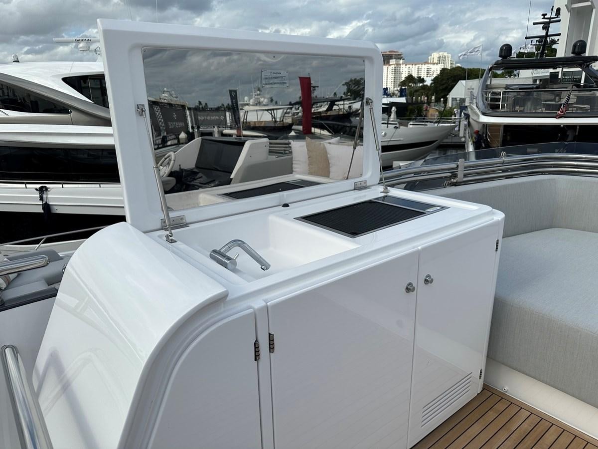 a white boat with a white door aboard SUNSET 8 Yacht for Sale