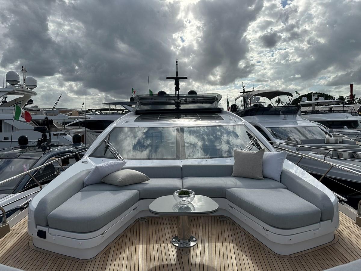 a white car parked on a deck aboard SUNSET 8 Yacht for Sale
