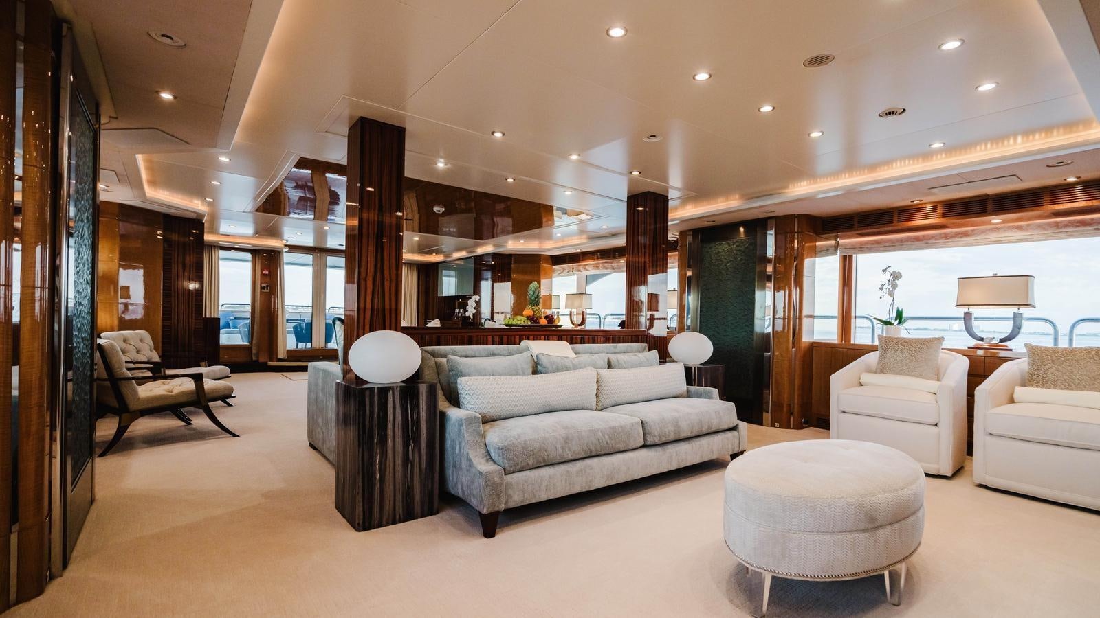 a living room with a large window aboard GROOVER Yacht for Sale