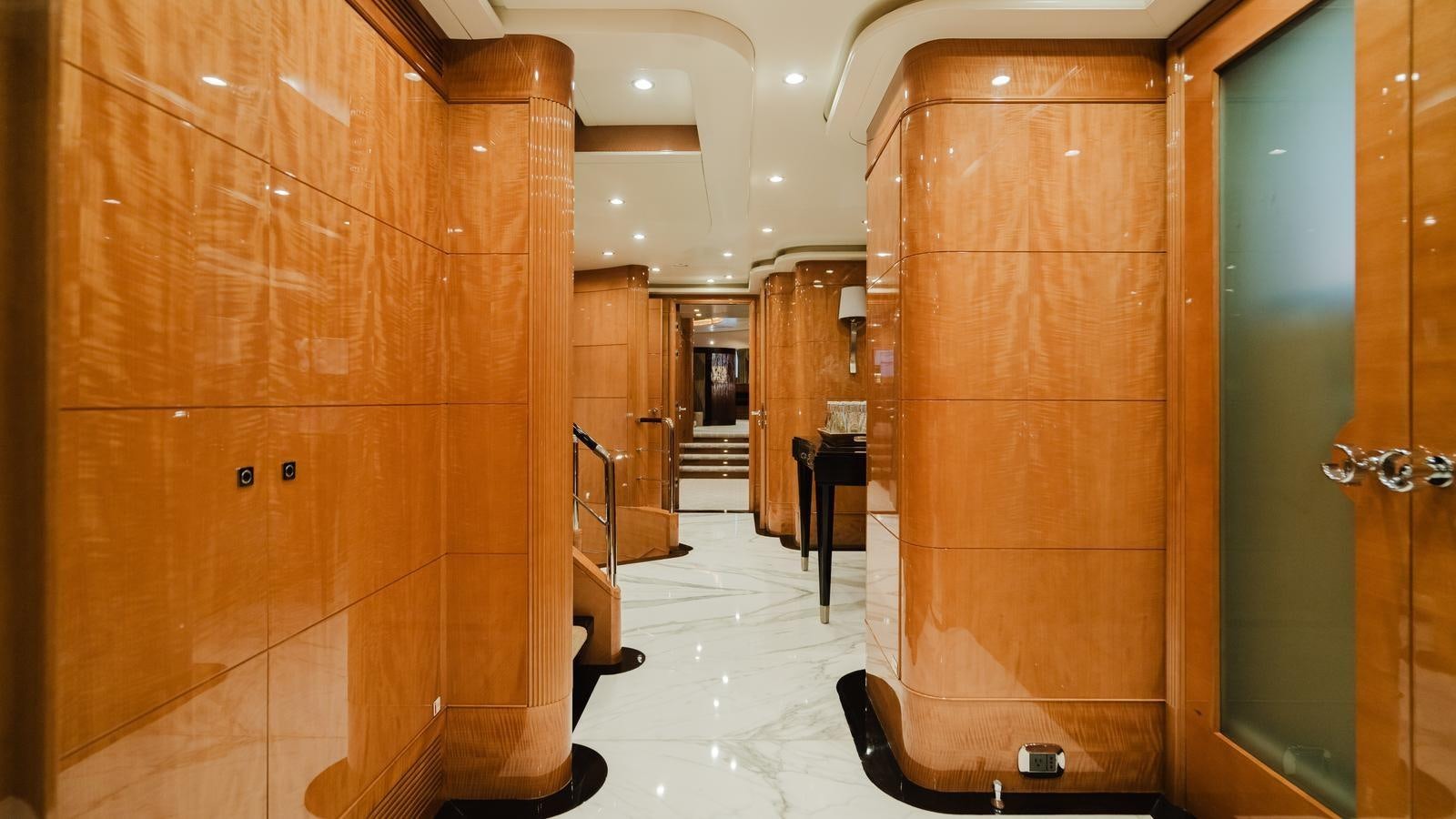 a room with wooden cabinets aboard GROOVER Yacht for Sale