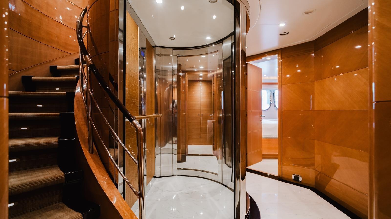 a hallway with wood walls aboard GROOVER Yacht for Sale