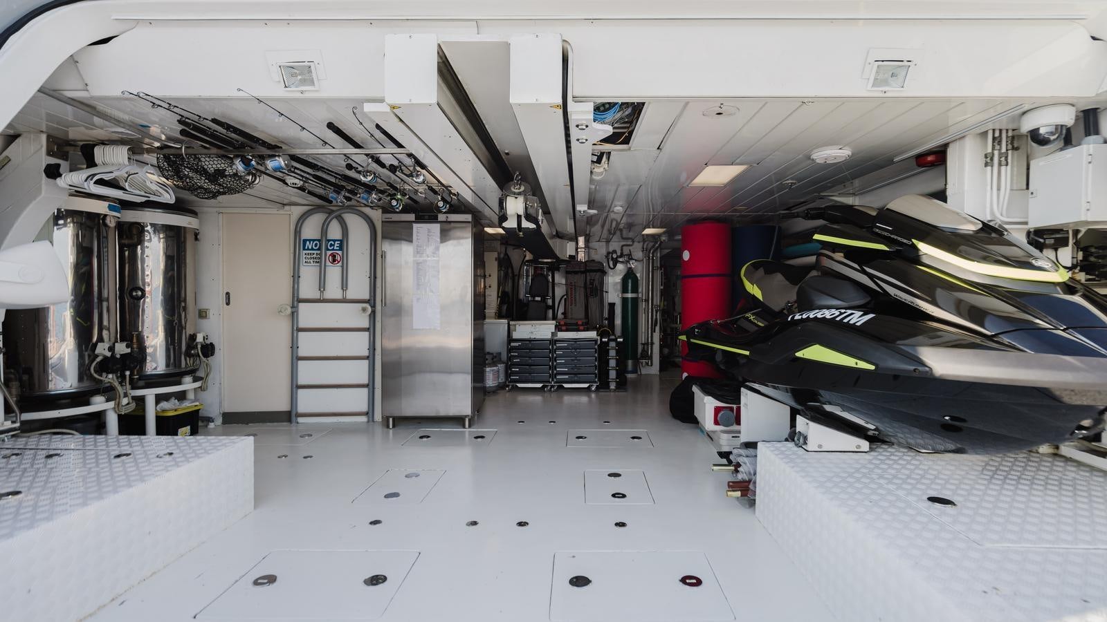 a room with a few machines aboard GROOVER Yacht for Sale