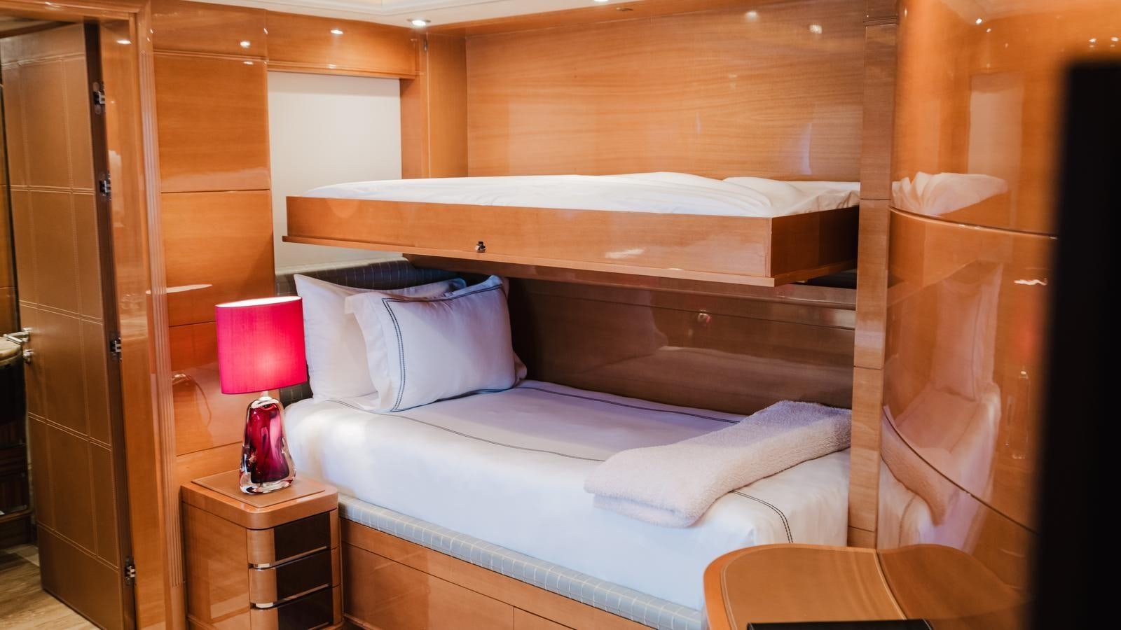 a bed in a room aboard GROOVER Yacht for Sale