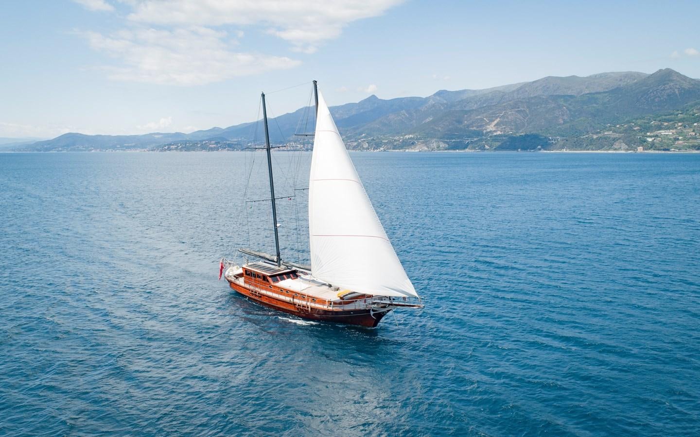 a sailboat on the water aboard DAI Yacht for Sale