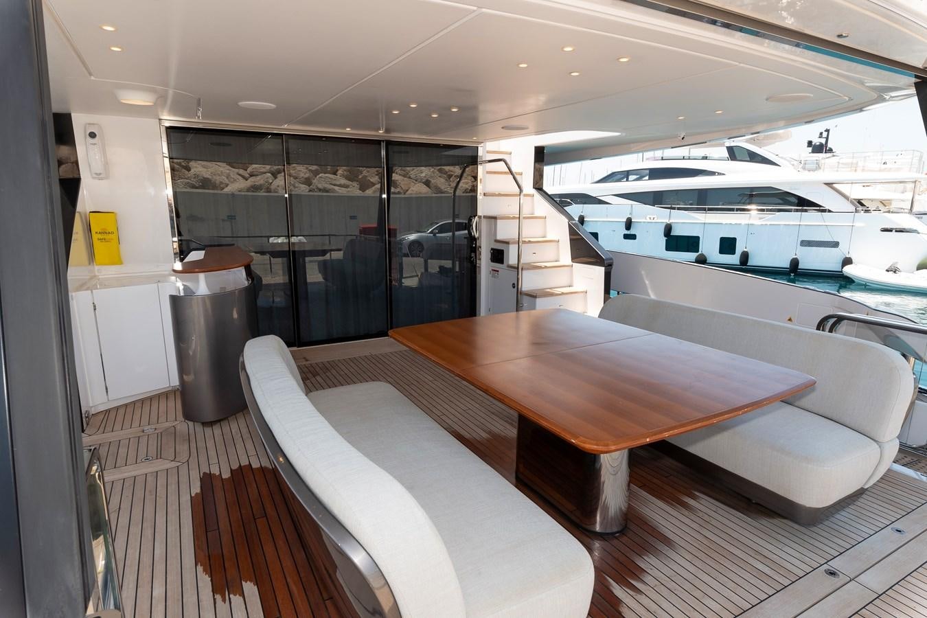 a room with a table and chairs aboard BREEZE Yacht for Sale
