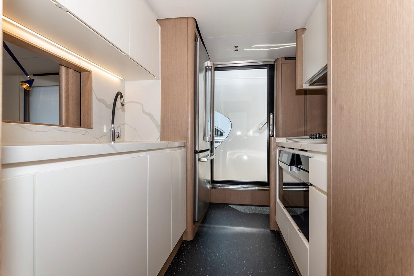 a bathroom with a glass shower aboard BREEZE Yacht for Sale
