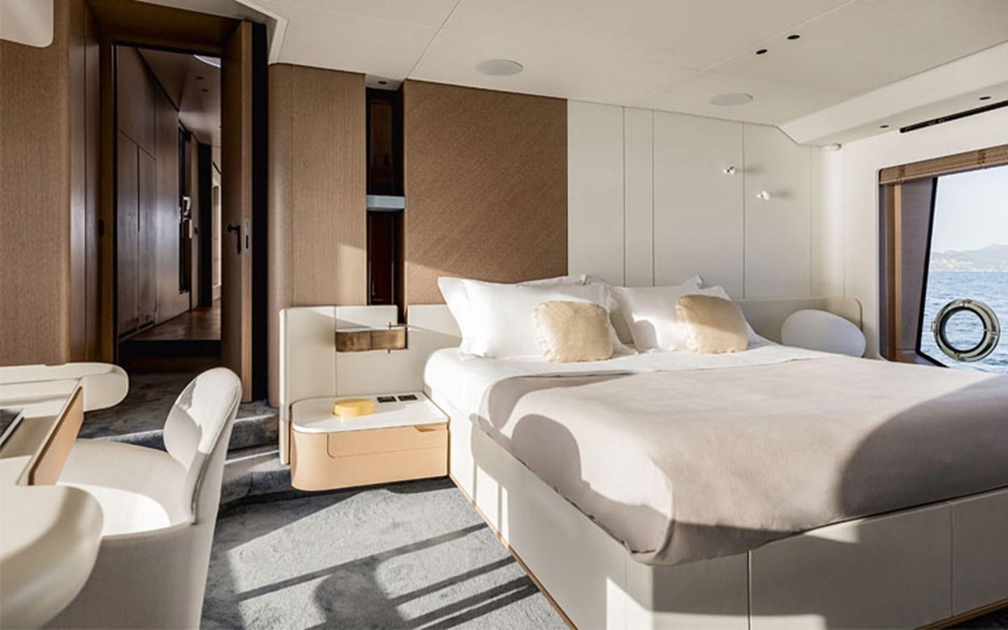 a bed in a room aboard BREEZE Yacht for Sale