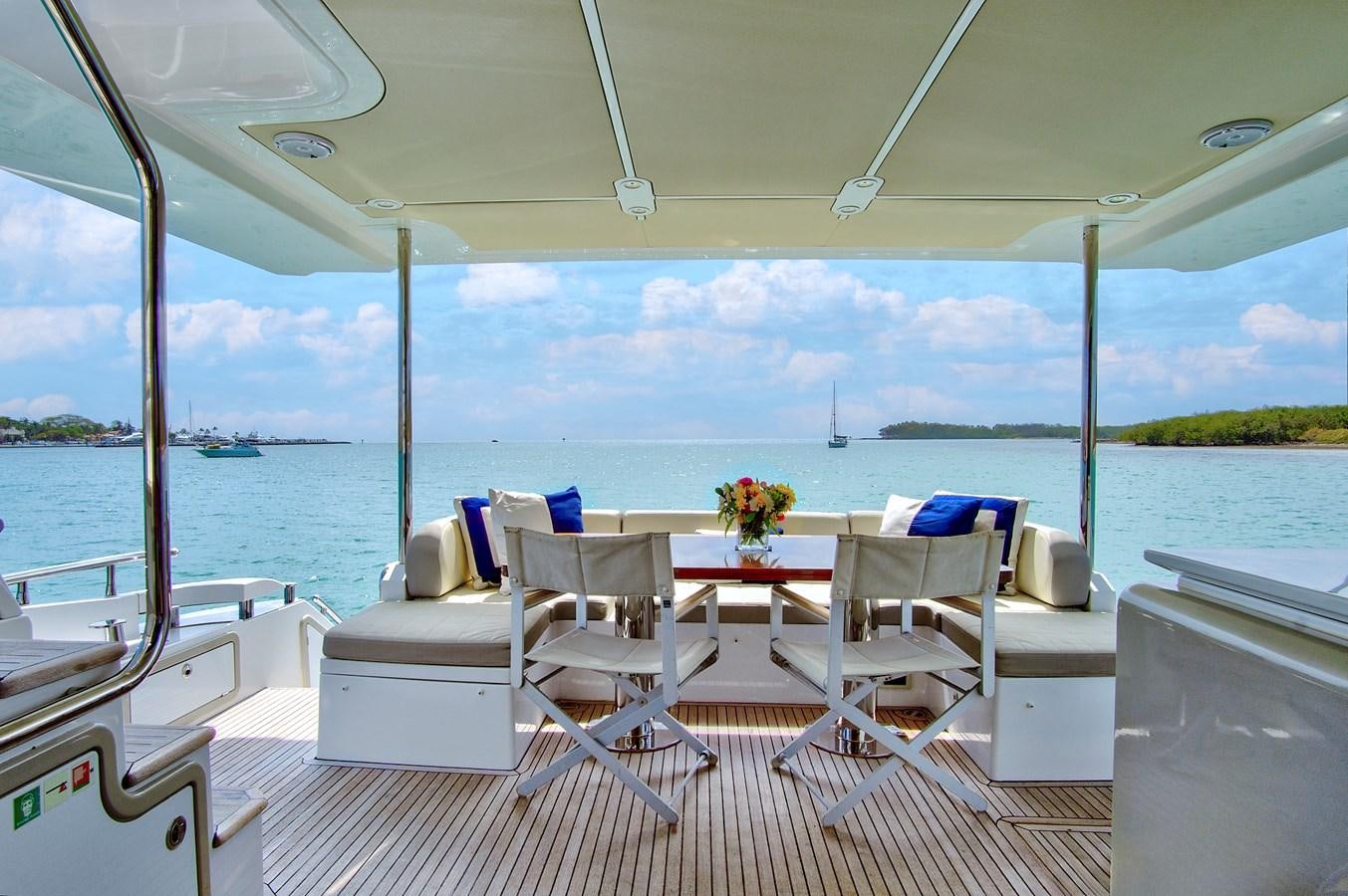 a boat with tables and chairs aboard GRATITUDE Yacht for Sale