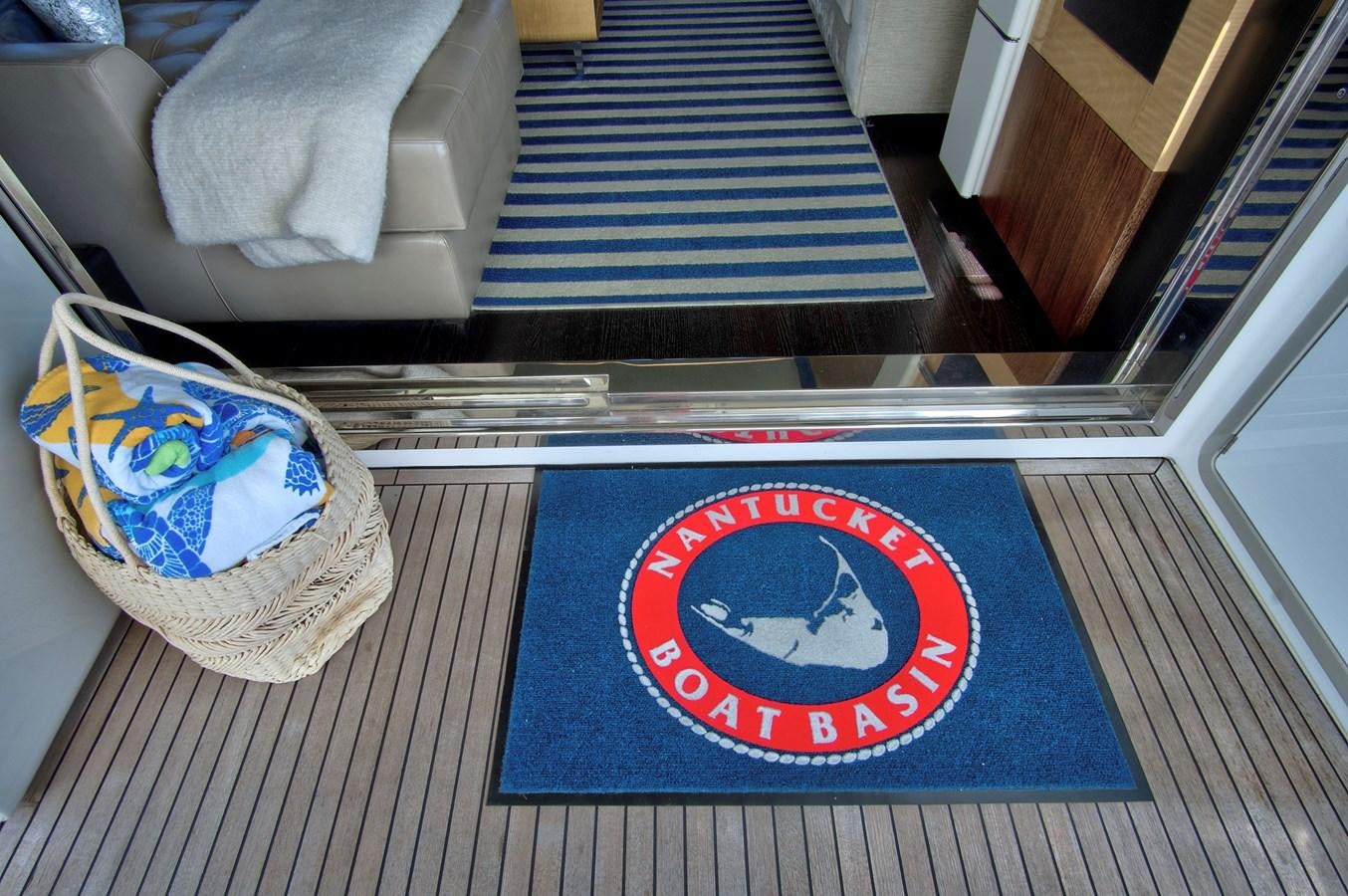 a clock on a table aboard GRATITUDE Yacht for Sale