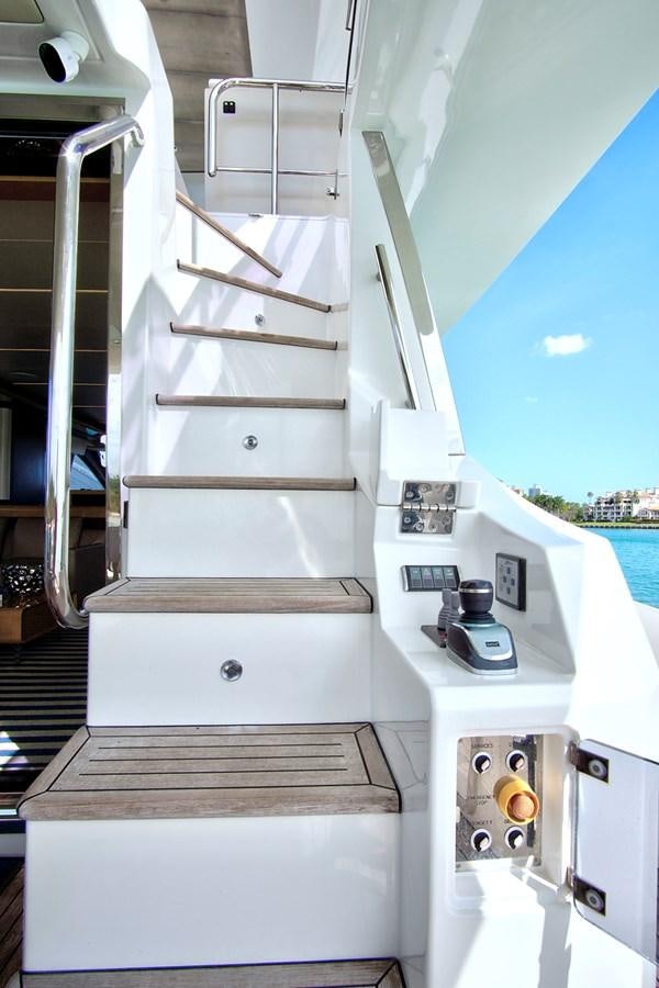a white machine with a metal frame aboard GRATITUDE Yacht for Sale