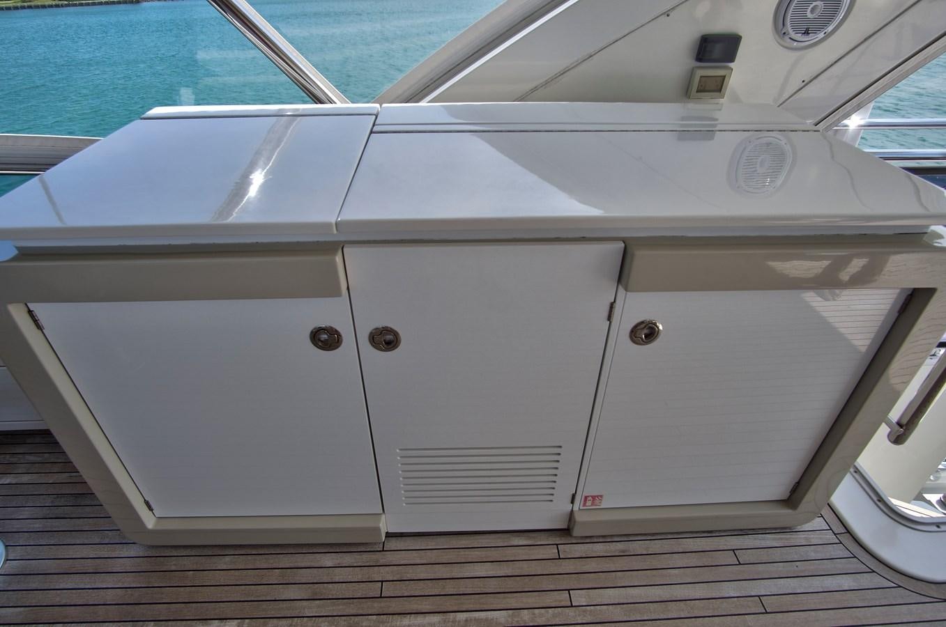 a white car with a door aboard GRATITUDE Yacht for Sale