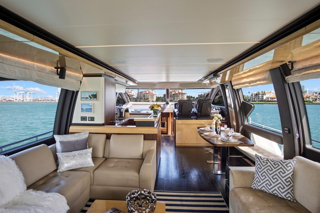 a car with a table and chairs aboard GRATITUDE Yacht for Sale