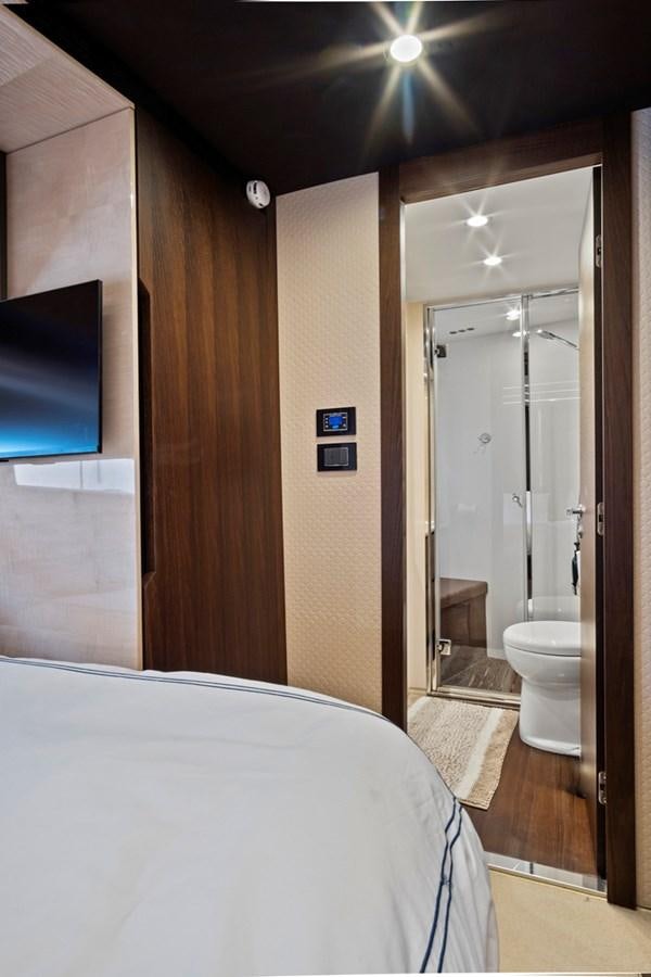 a bathroom with a large mirror aboard GRATITUDE Yacht for Sale