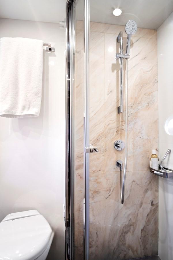 a shower with a toilet aboard GRATITUDE Yacht for Sale