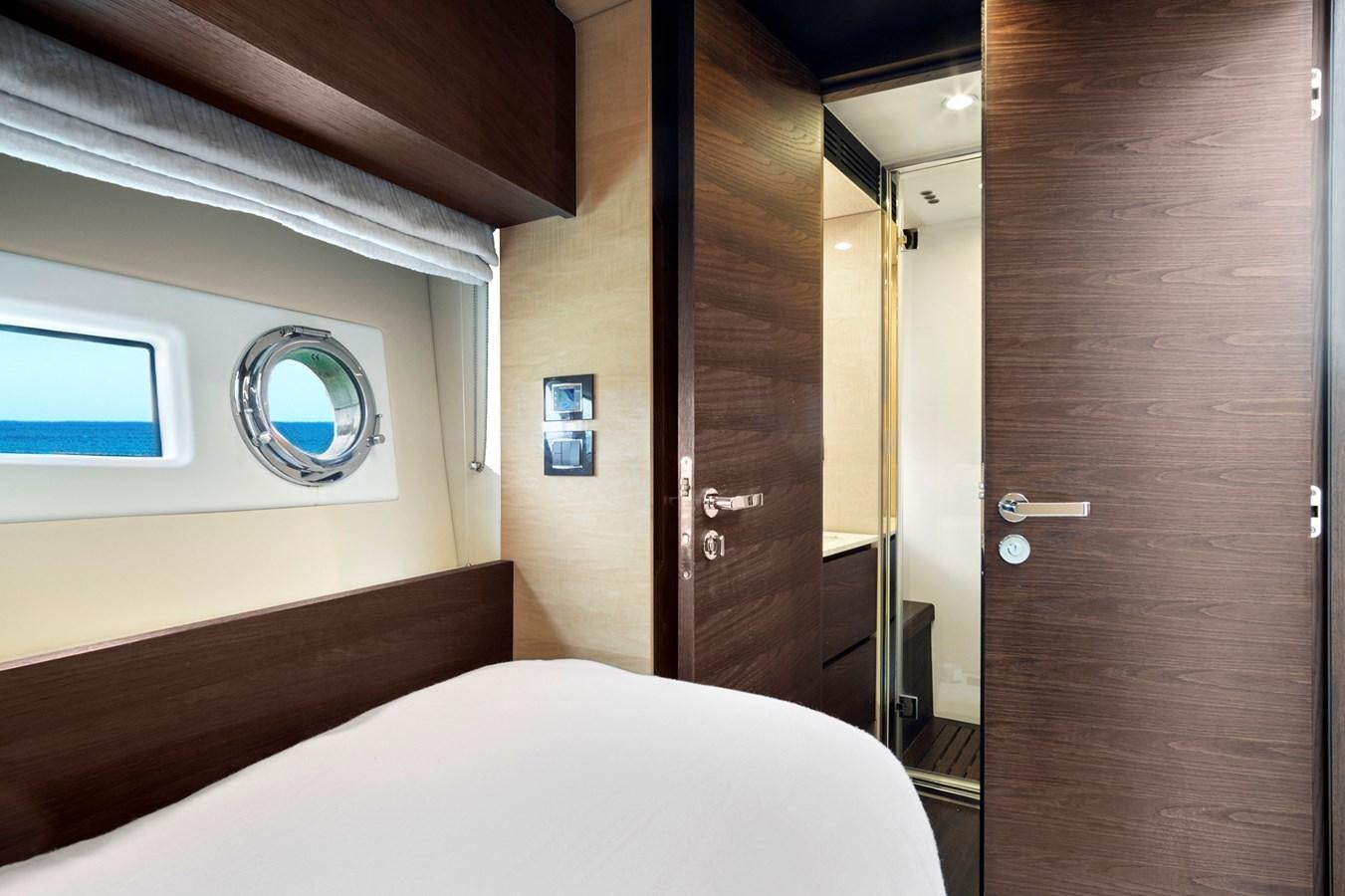 a bed in a room aboard GRATITUDE Yacht for Sale