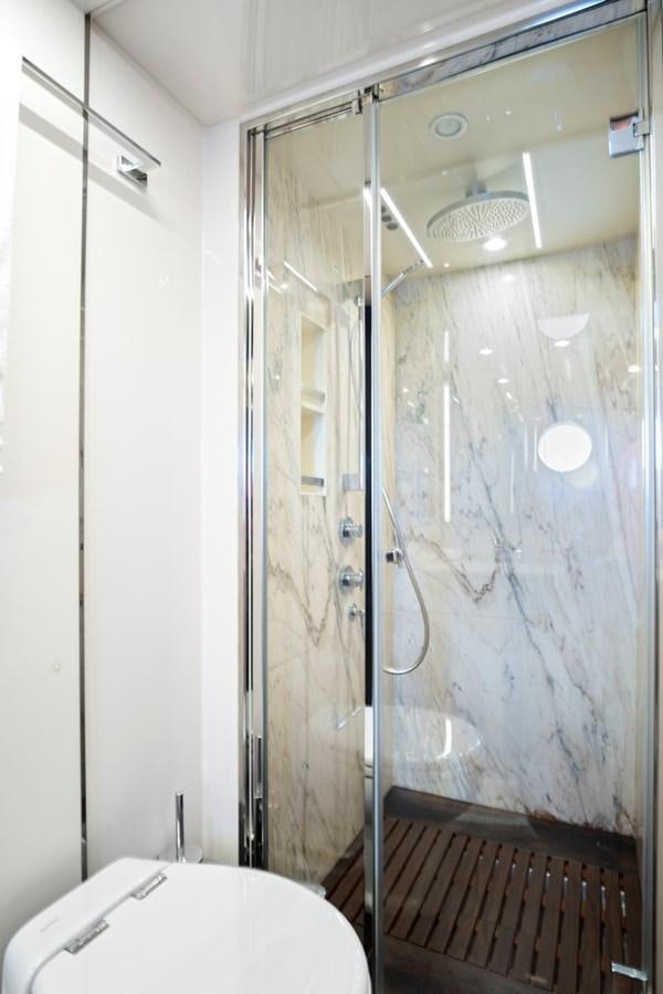 a shower with a glass door aboard GRATITUDE Yacht for Sale