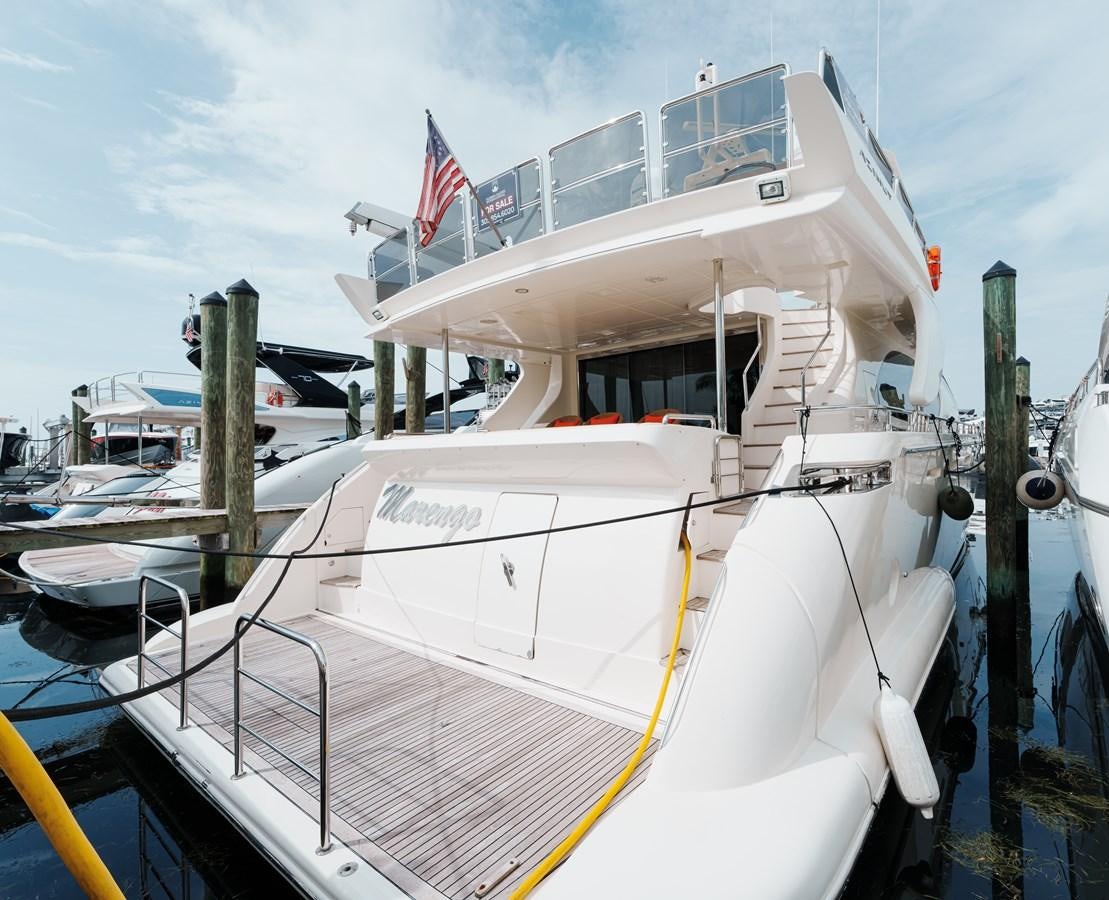 a boat docked at a pier aboard AZIMUT 85 FLY Yacht for Sale