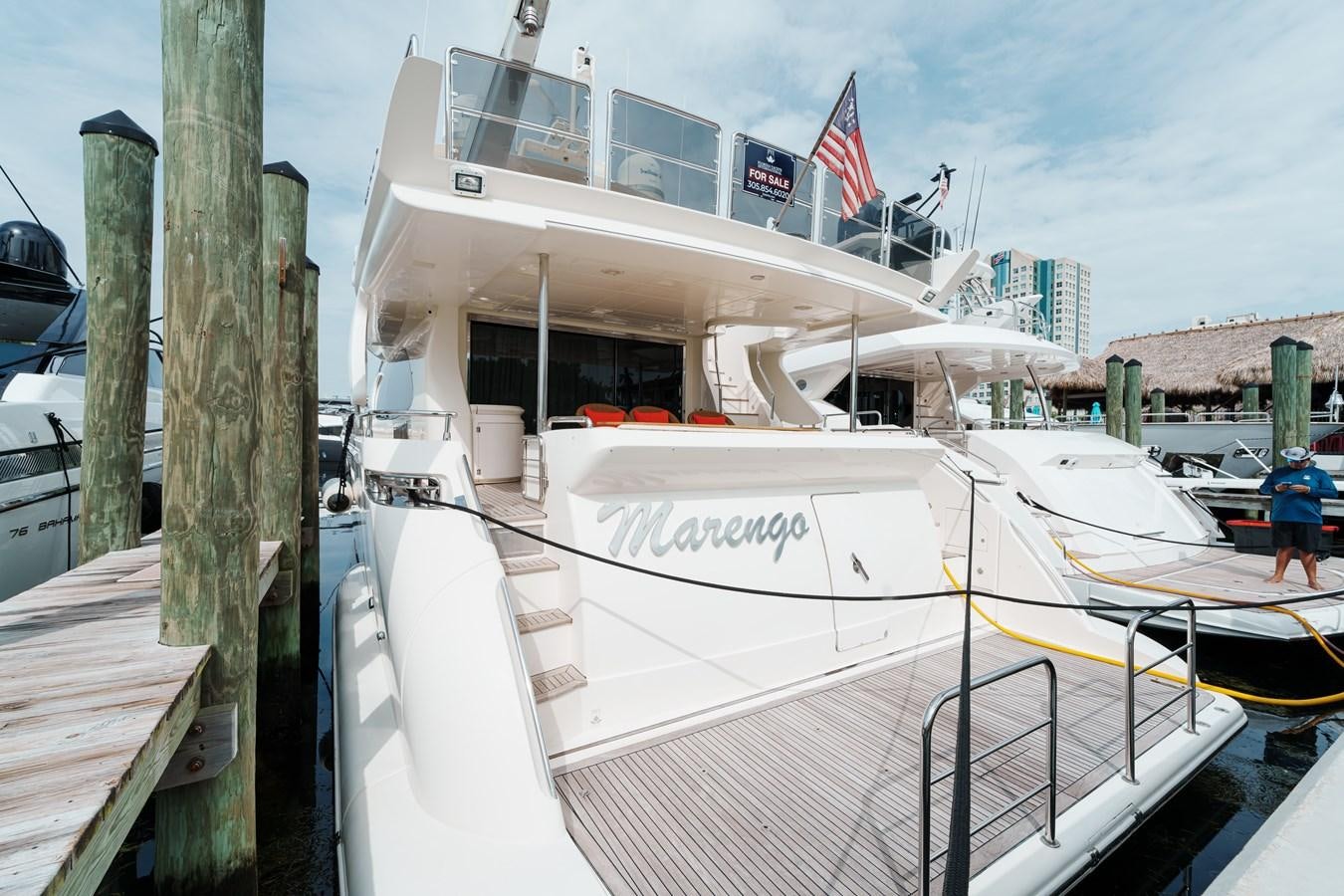 a boat docked at a pier aboard AZIMUT 85 FLY Yacht for Sale