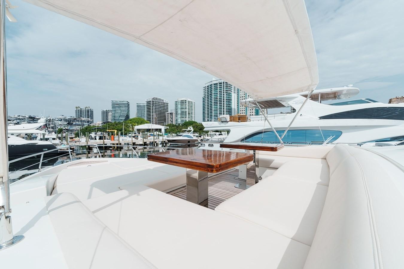 a rooftop with a view of a city and water aboard AZIMUT 85 FLY Yacht for Sale