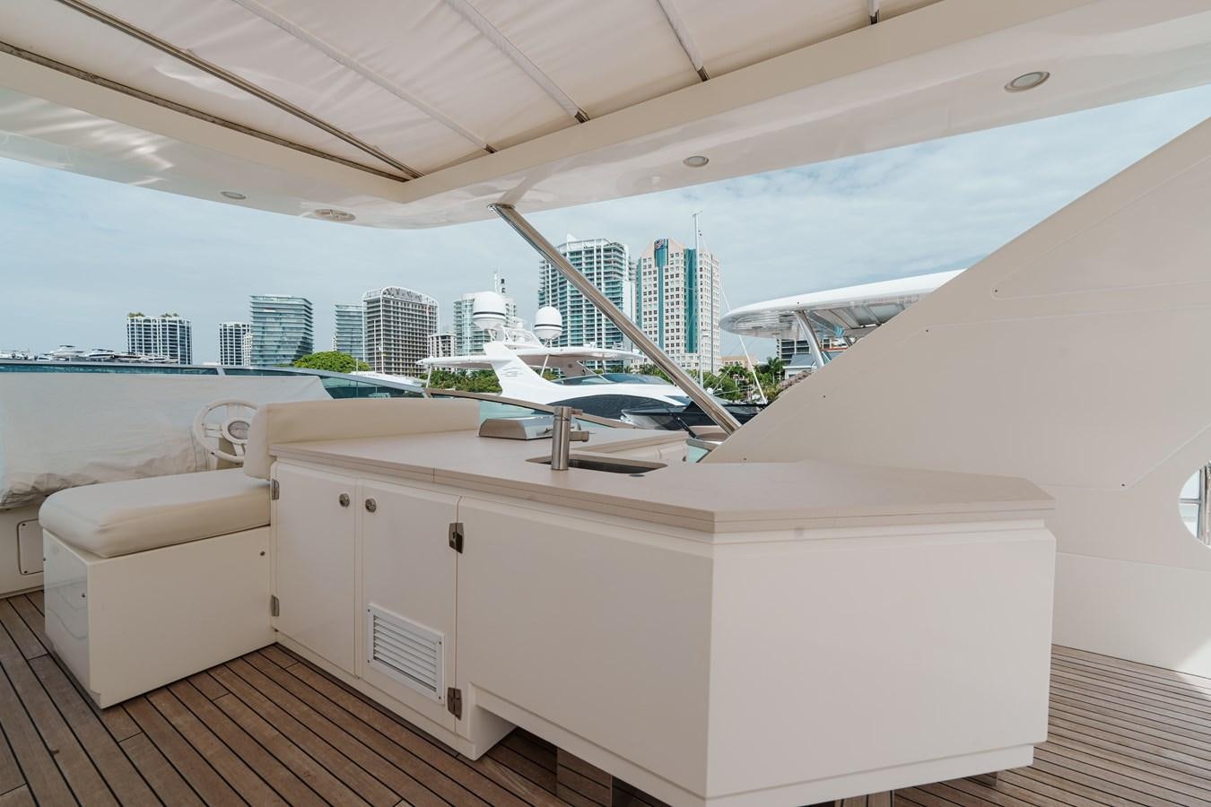 a room with a view of a city aboard AZIMUT 85 FLY Yacht for Sale