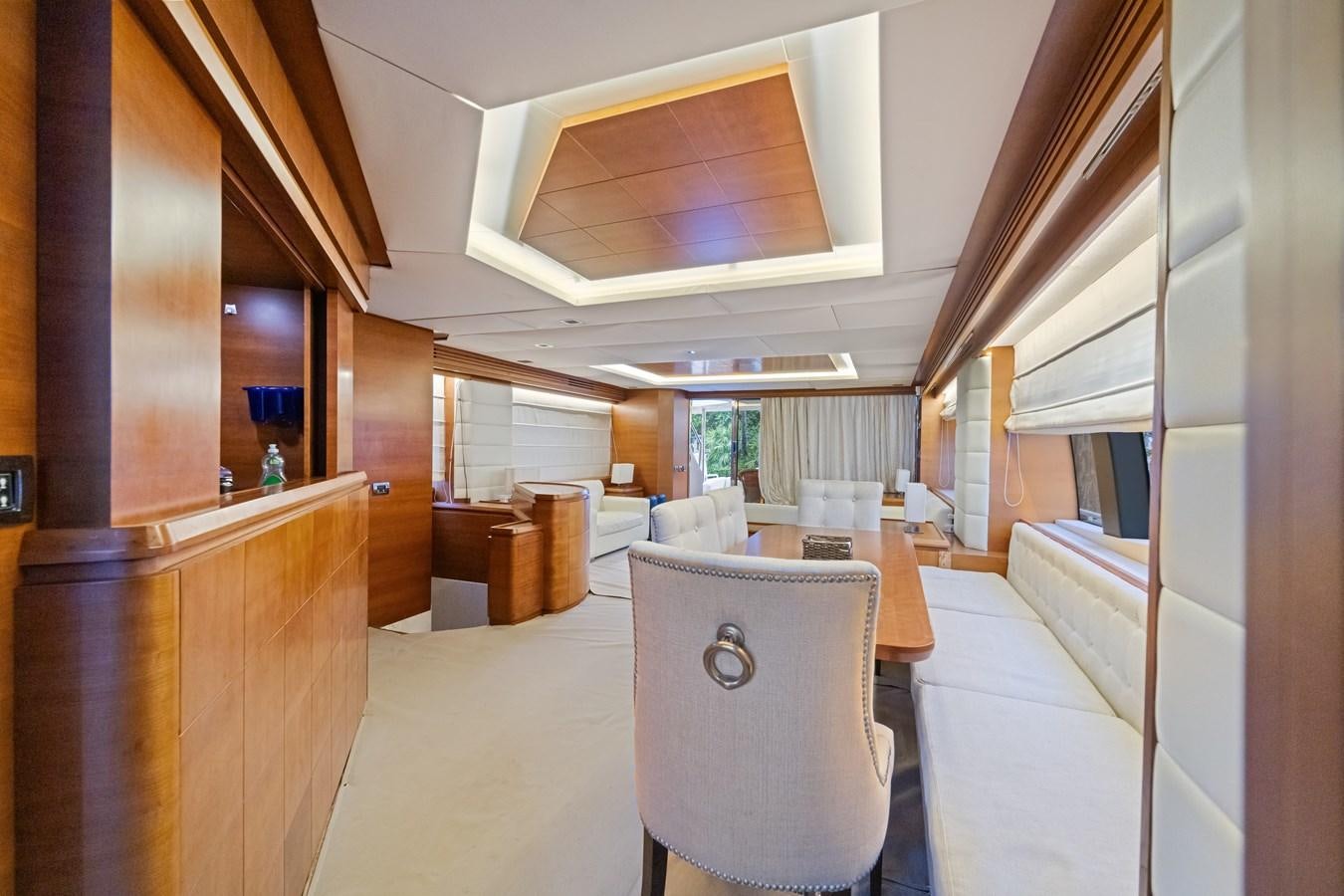 a room with a couch and a table aboard AZIMUT 85 FLY Yacht for Sale