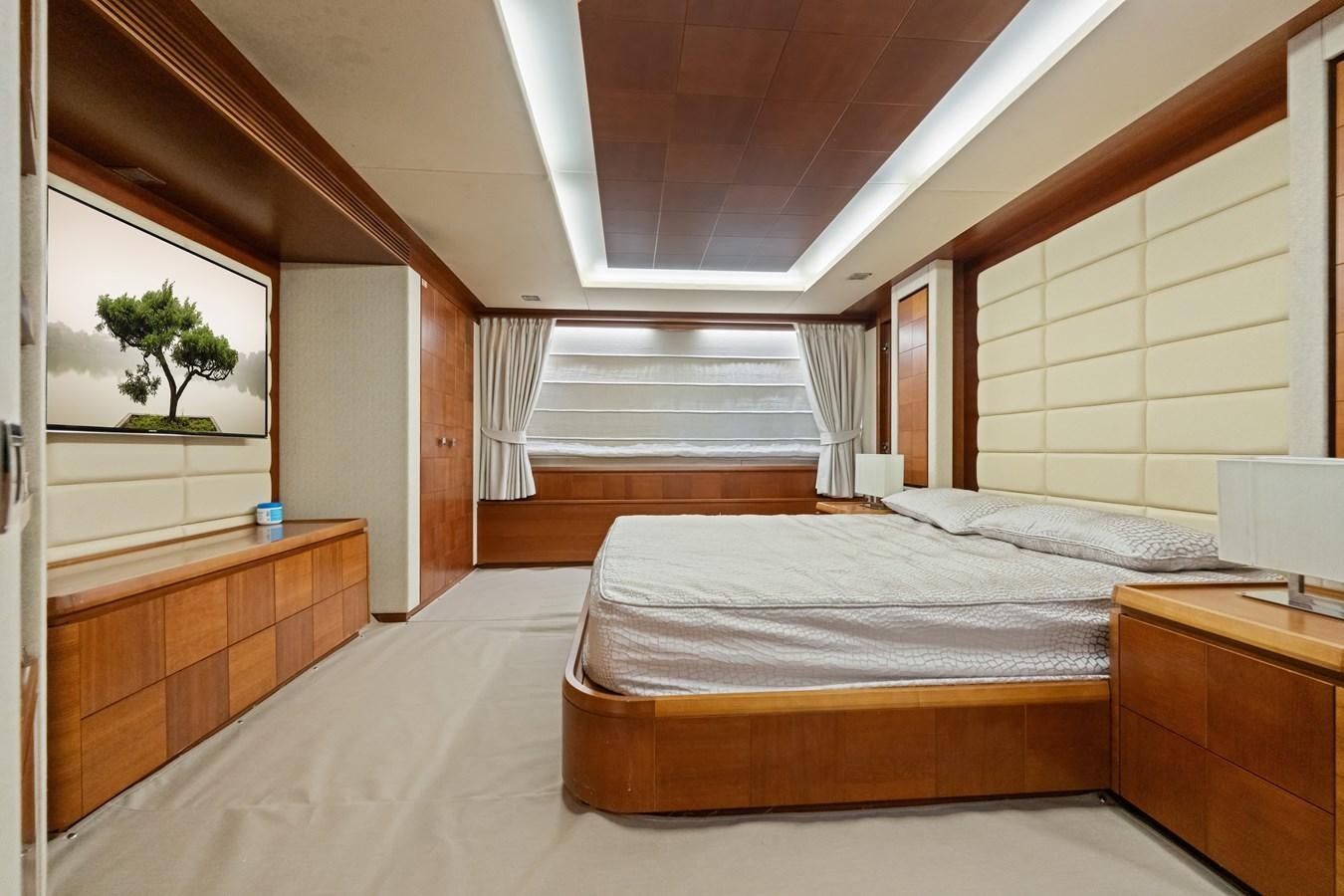 a bedroom with a large bed aboard AZIMUT 85 FLY Yacht for Sale
