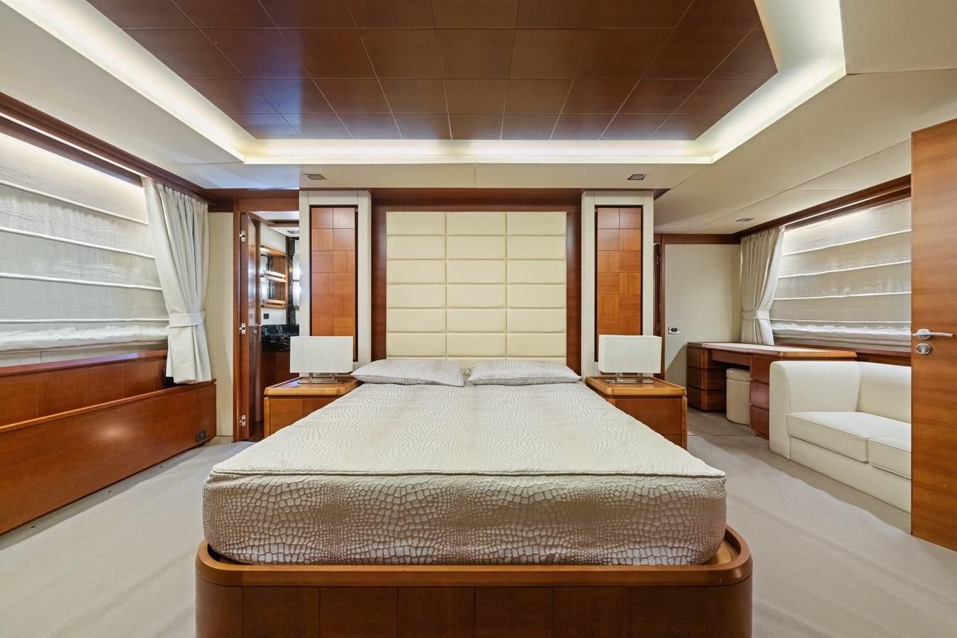 a large bedroom with a bed aboard AZIMUT 85 FLY Yacht for Sale