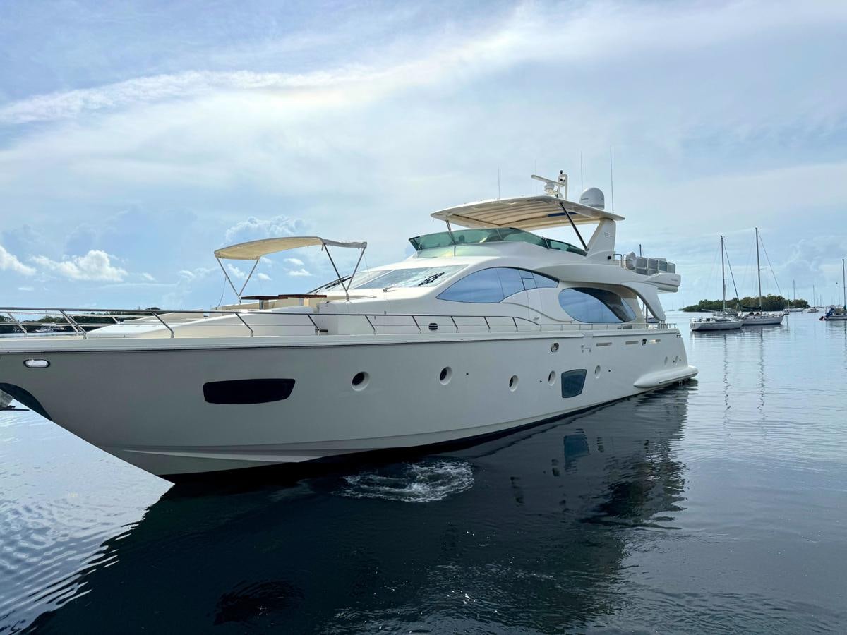 a white yacht in the water aboard AZIMUT 85 FLY Yacht for Sale