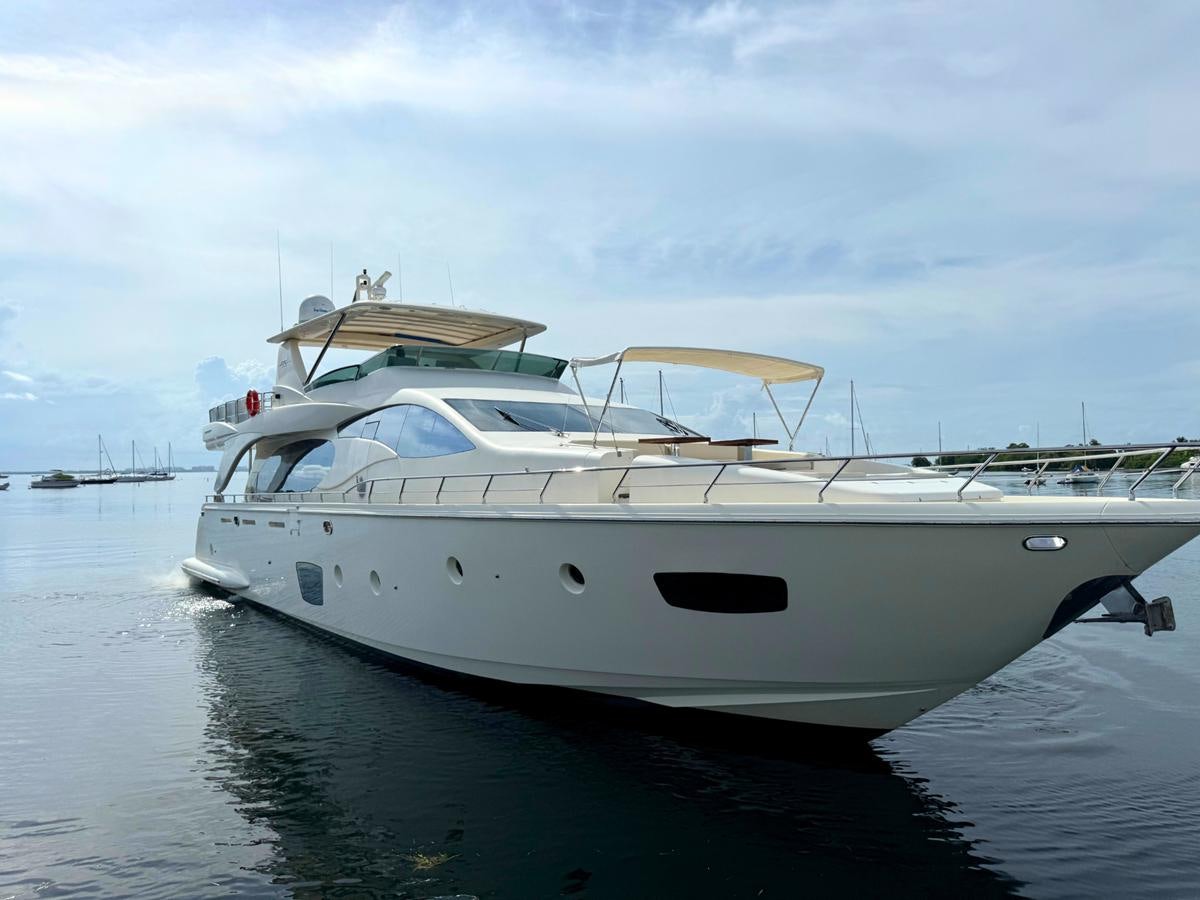 a white yacht on the water aboard AZIMUT 85 FLY Yacht for Sale