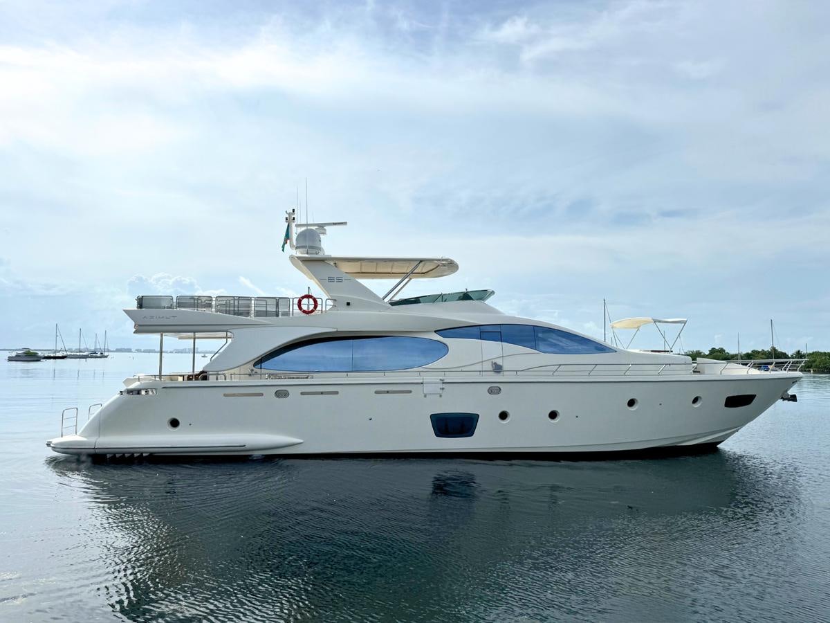 a white yacht in the water aboard AZIMUT 85 FLY Yacht for Sale