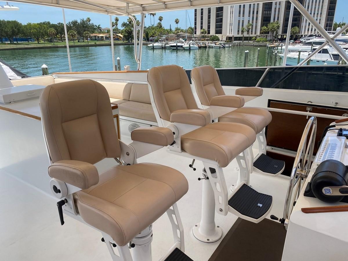 a boat with chairs on it aboard VICTORY Yacht for Sale