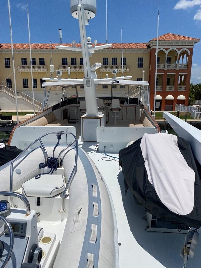 a large white building with a cross on the roof aboard VICTORY Yacht for Sale