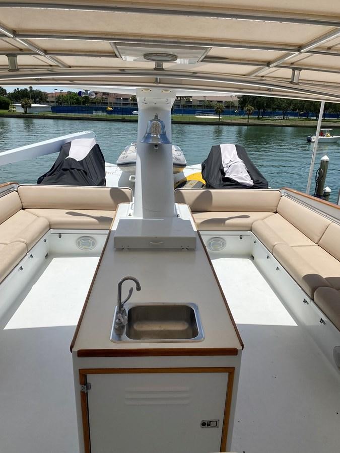 a boat with a large white tower aboard VICTORY Yacht for Sale
