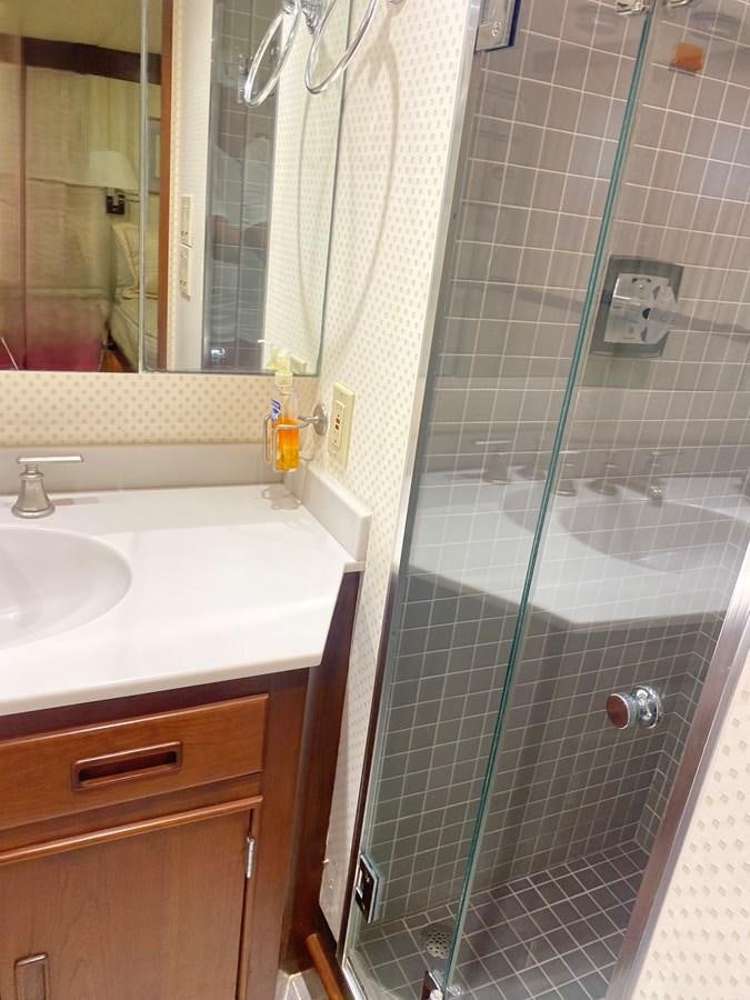 a shower with a glass door aboard VICTORY Yacht for Sale