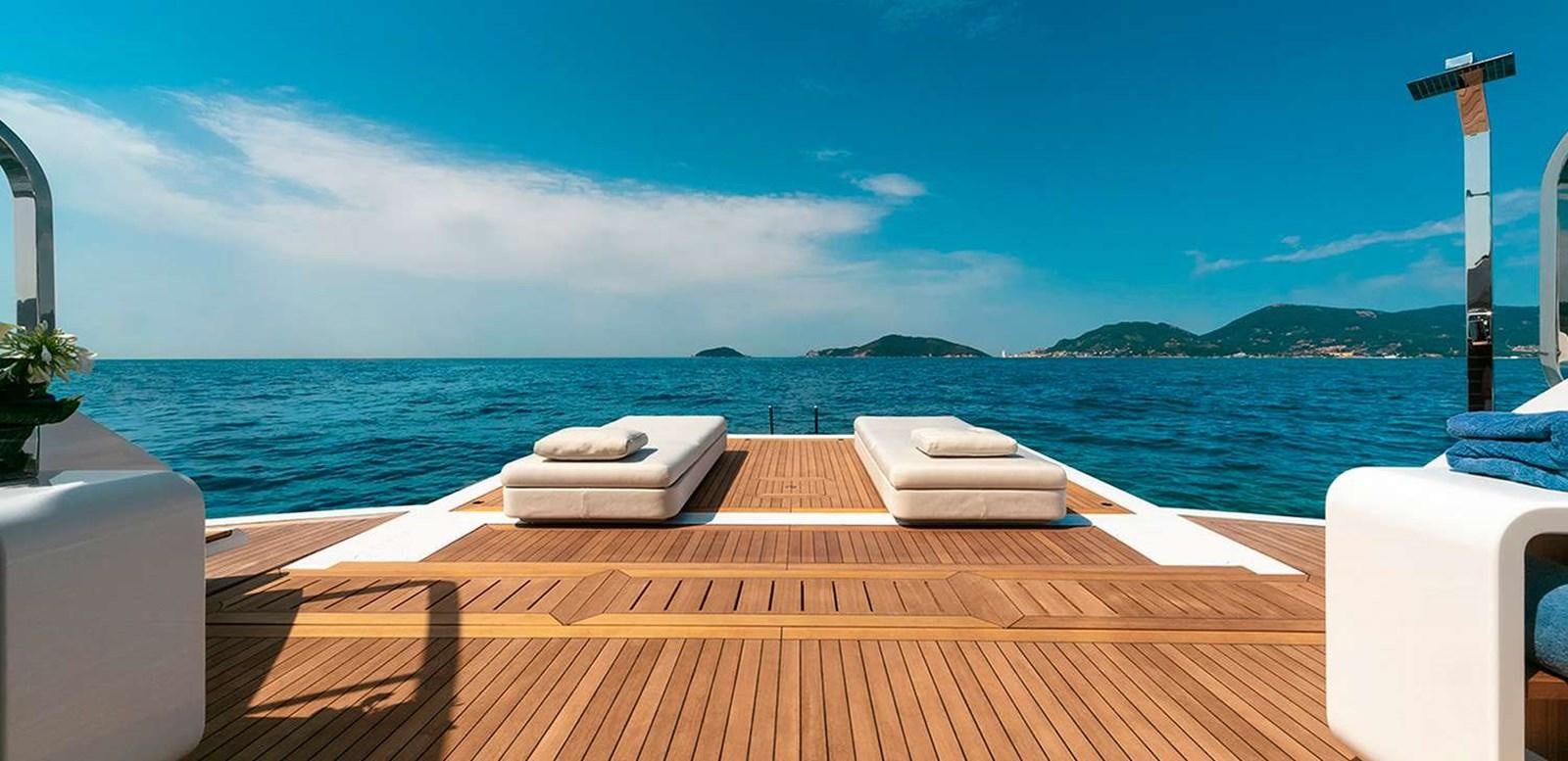 a deck overlooking a body of water aboard EL LEON Yacht for Sale