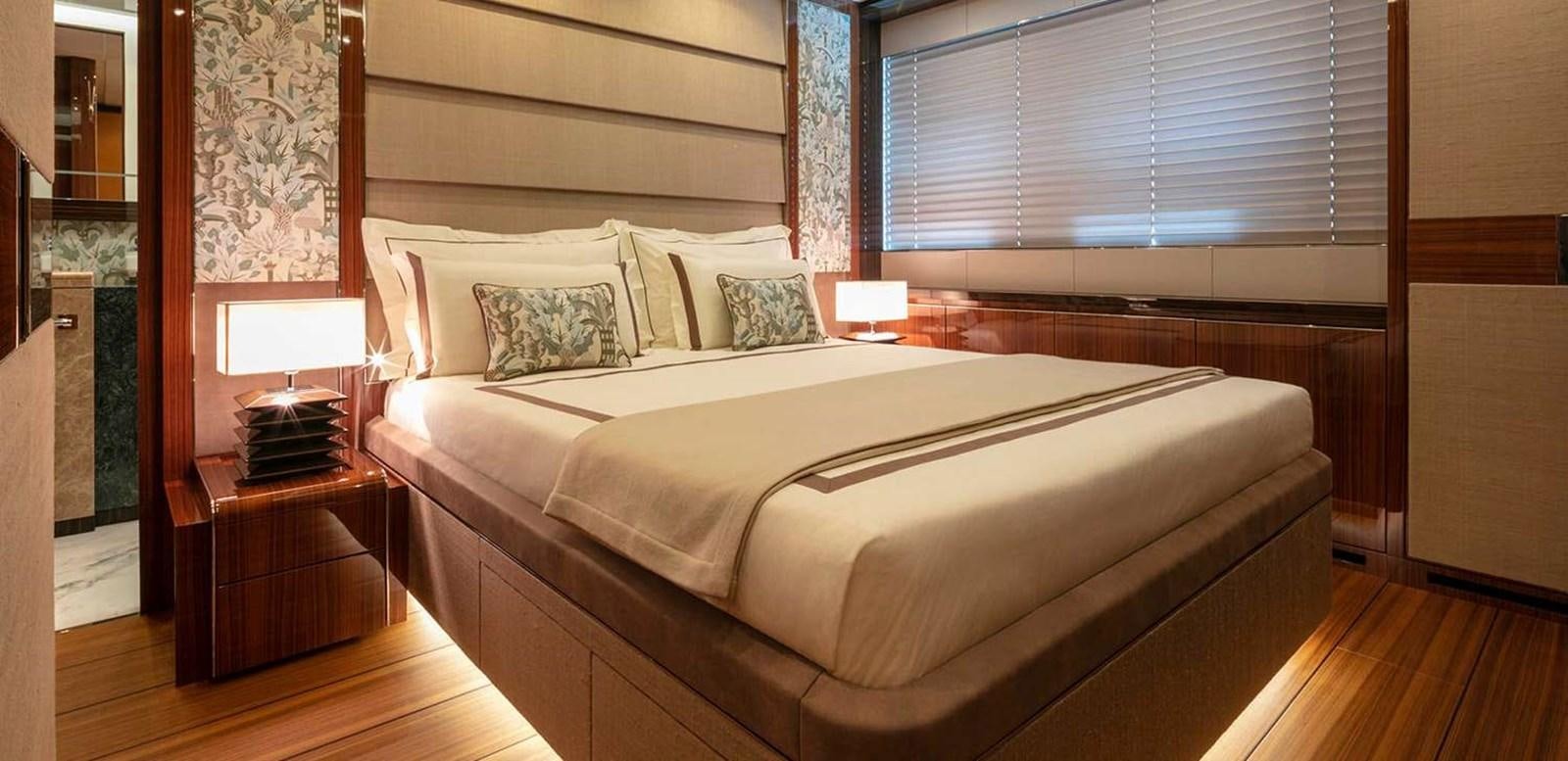 a bed in a room aboard EL LEON Yacht for Sale