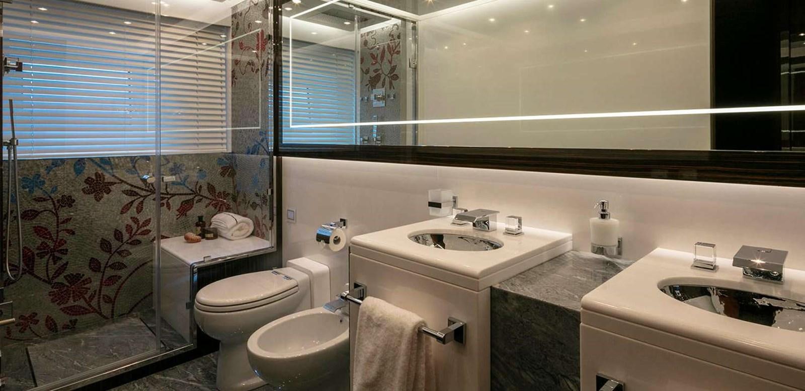 a bathroom with a large window aboard EL LEON Yacht for Sale