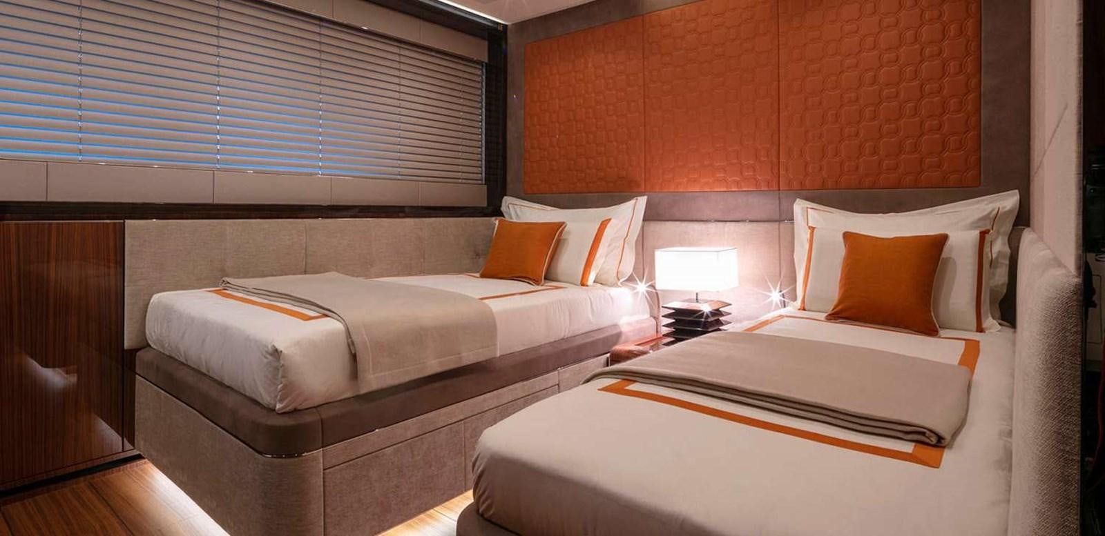 a couple of beds in a hotel room aboard EL LEON Yacht for Sale