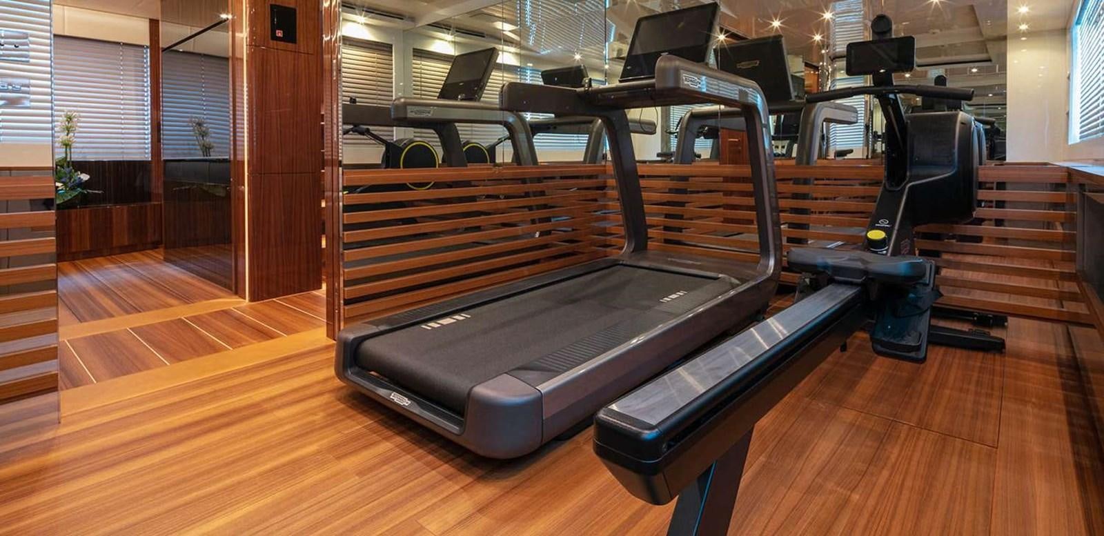 a large black piano aboard EL LEON Yacht for Sale